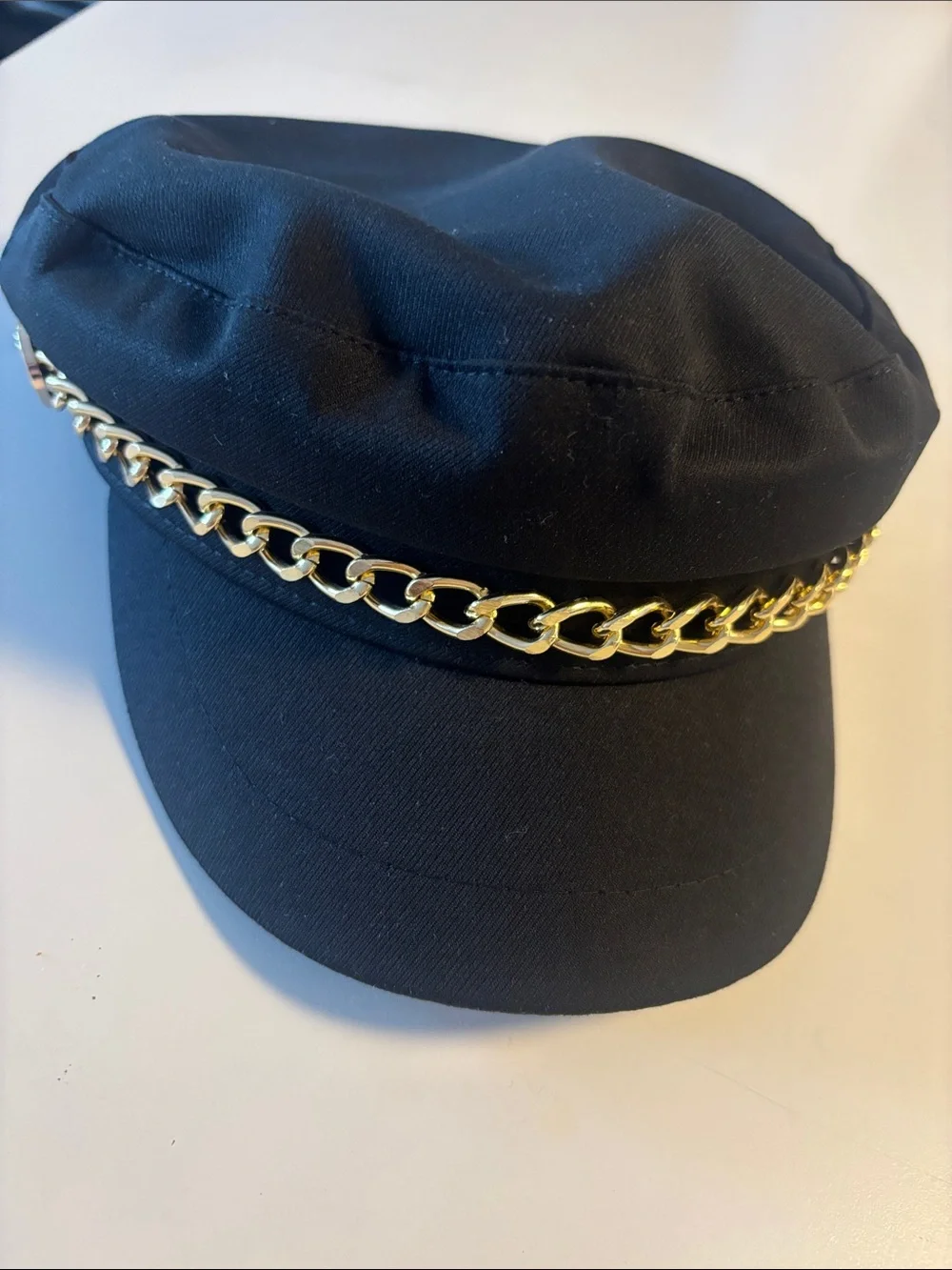 Studio F cap with gold chain accent